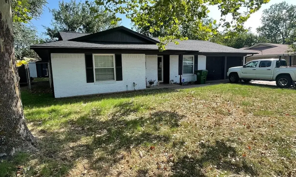 Professional roofing crew working on a residential roof in Tampa